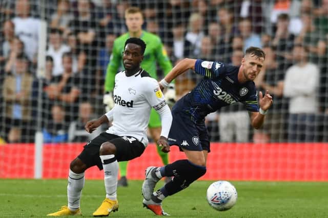Leeds United's Barry Douglas takes on Derby's Florian Jozefzoon. 
Picture: Jonathan Gawthorpe