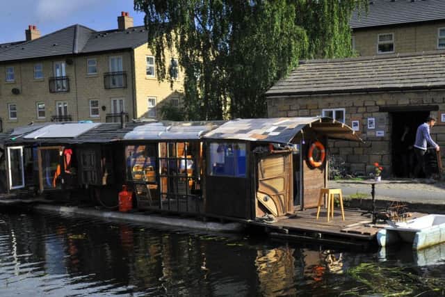 Ben Cummins'  floating shed at Oddy Locks  on the Leeds Liverpool canal in Leeds.