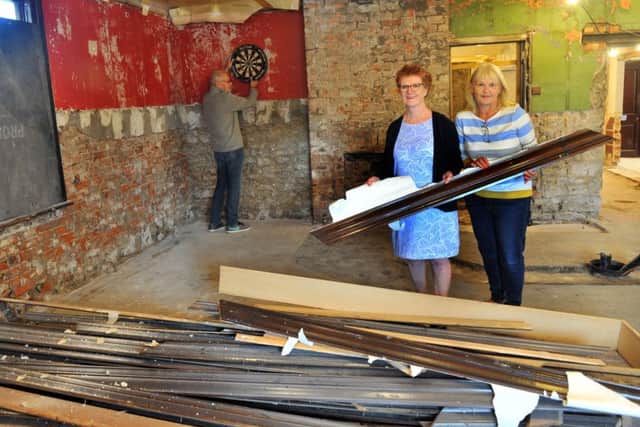 WORK AHEAD: Mike Wright , Sue Babington and Lesley Wright members of the Church Fenton Community Hub at the White Horse pub.