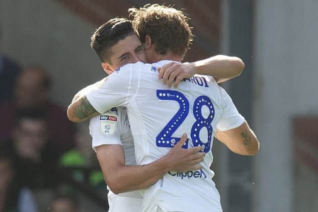 Leeds United's Pablo Hernandez (left) celebrates scoring his side's third goal at Norwich with team-mate Gaetano Berardi. PIC: Mark Pain/PA Wire
