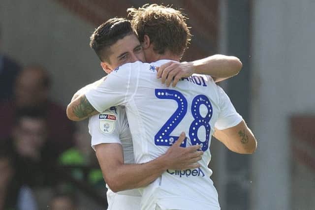 Leeds United's Pablo Hernandez (left) celebrates scoring his side's third goal at Norwich with team-mate Gaetano Berardi.  PIC: Mark Pain/PA Wire