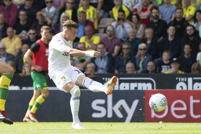 Leeds United's Gjanni Alioski scores his side's second goal at Norwich City.