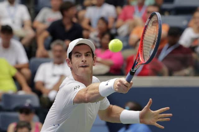 Andy Murray returns against James Duckworth during their first round of the US Open clash in New York. Picture: AP/Andres Kudacki