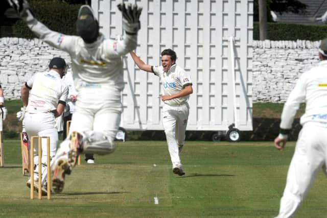 Charlie Best, of Pudsey St Lawrence, is out caught by New Farnley wicketkeeper Steve Bullen off the bowling of Andrew Brewster. PIC: Steve Riding