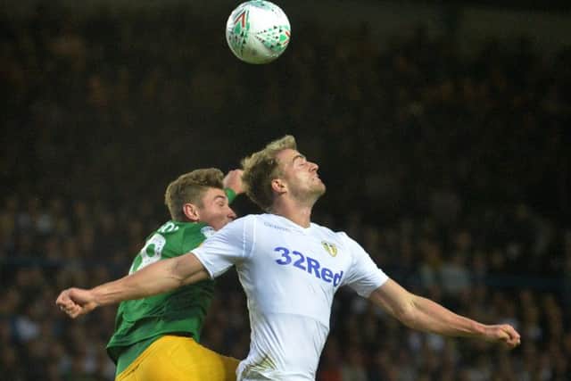 Ryan Ledson and Patrick Bamford battle for the ball at Elland Road.  Picture: Bruce Rollinson