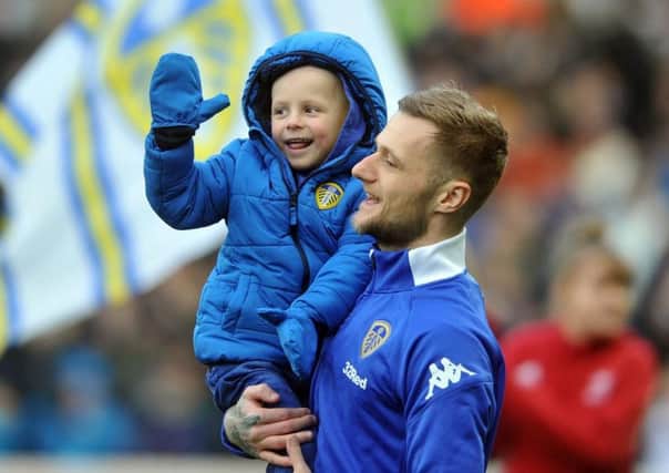 SUPPORT: Toby Nye, pictured with Leeds United defender Liam Cooper.