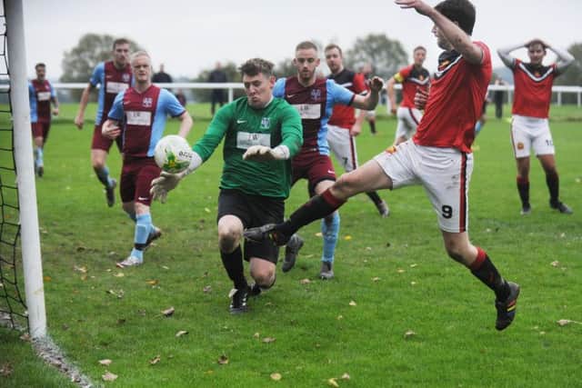 Jimmy Lee scores for Leeds Modernians against Rawdon Old Boys in the West Yorkshire League Division 1.