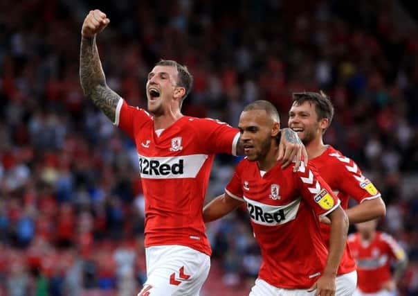 Middlesbrough defender Aden Flint celebrates scoring against Sheffield United.