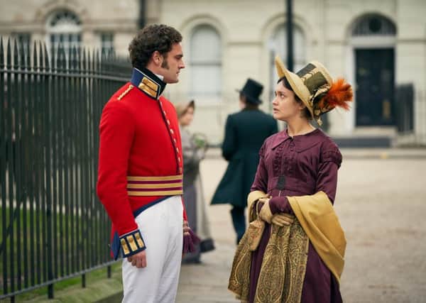 UNIFORM APPROACH: Tom Bateman as Rawdon Crawley and Olivia Cooke as Becky Sharp in a scene from Vanity Fair.