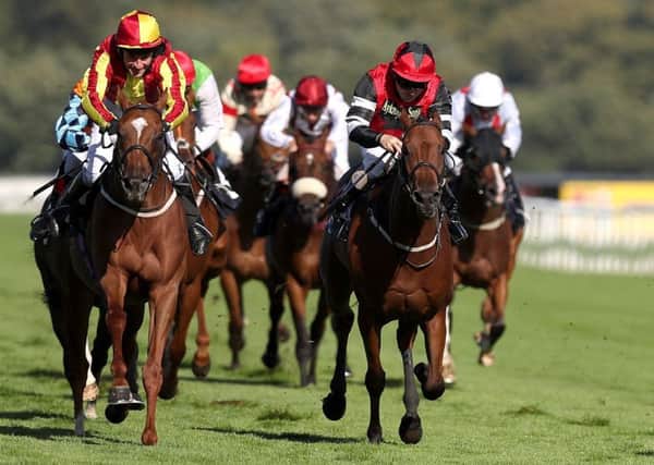 Off Art ridden (left) by Brian Harding wins The Clipper Logistics Leger Legends Classified Stakes in 2017 (Picture: PA)