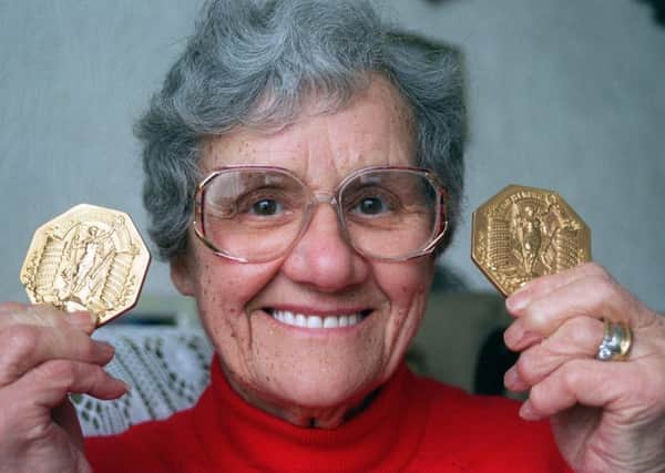 GOLDEN GIRL: Doris Storey with her medals in 1996.