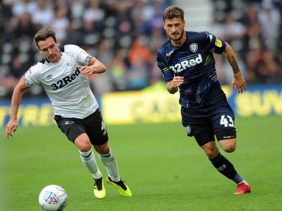 Leeds United's Mateusz Klich in action against Derby County.