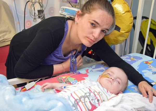 Kerrie Short and her son Harry Clarke, who is being cared for at Newcastle's Freeman Hospital with dilated cardiomyopathy. His family have been told that the only hope for the eight-month-old is a heart transplant, as new figures show that parents are significantly less likely to consent to donate a child's organs if they die compared to other relatives. PIC: PA