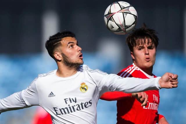 The last to go: Oliver Sarkic, right, in action for Benfica against Real Madrid.