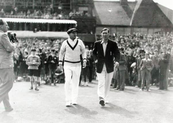 Crowd-puller: Don Bradman with Norman Yardley, right.