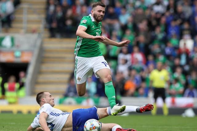 Leeds' Stuart Dallas (right) played a full 90 minutes for Northern Ireland on Saturday. PIC: Brian Lawless/PA Wire