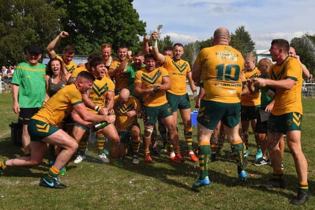 Hunslet Club Parkside celebrate with the National Conference Premier Division league leaders' trophy. Picture: Matthew Merrick.
