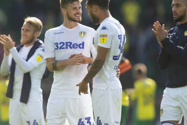 Leeds United's Mateusz Klich (left) and Lewis Baker (right) after the Sky Bet Championship match at Carrow Road.