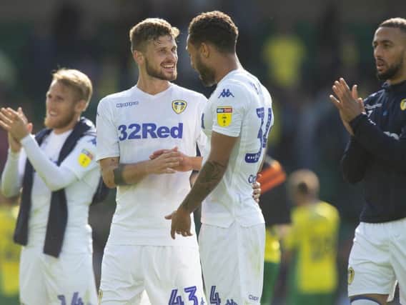 Leeds United's Mateusz Klich (left) and Lewis Baker (right) after the Sky Bet Championship match at Carrow Road.