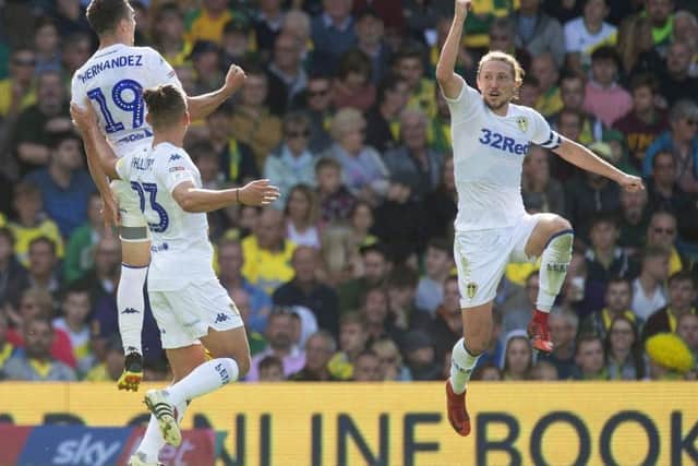 Luke Ayling celebrates at Norwich with team-mates Pablo Hernandez and Kalvin Phillips. PIC: Mark Pain/PA Wire