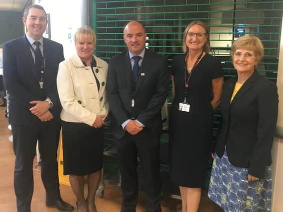Philip (pictured, middle) with other HDFT board members includinf Chief Executive, Dr Ros Tolcher (centre left) on his last day at the Trust.