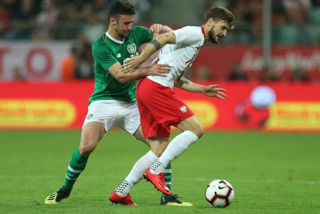 Leeds United's Mateusz Klich (right).