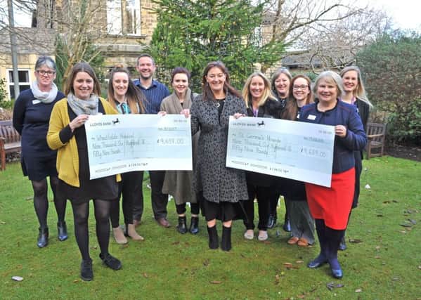 APPEAL: YEP editor Hannah Thaxter at a cheque presentation to St Gemmas and Wheatfields hospices.