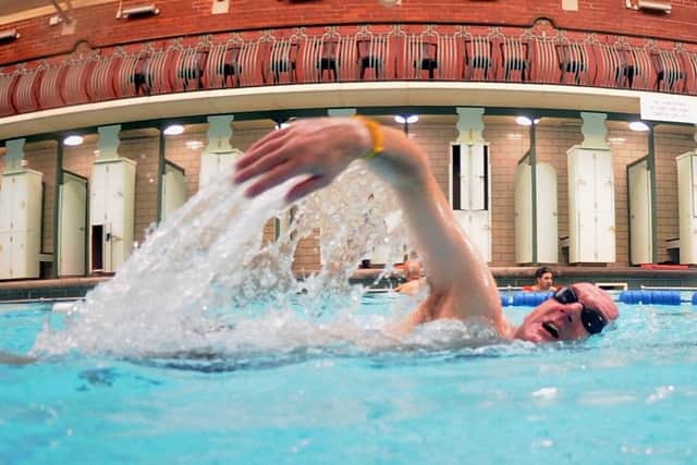 SOCIAL ENTERPRISE: Owen Scurrah-Smyth enjoying a swim. PIC: Simon Hulme
