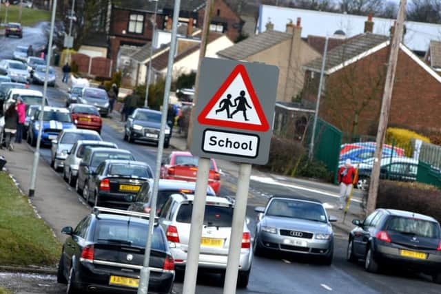 TRAFFIC: A survey quizzed parents about their efforts to reduce the number of cars at the school gate.