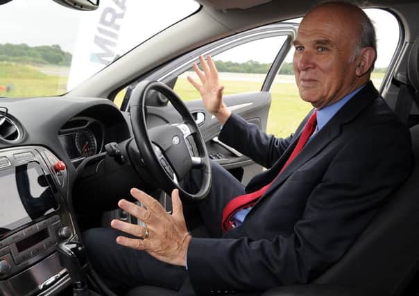 HANDS FREE: Former Business Secretary Vince Cable in a driverless car at a research facility in 2014. Picture:  Rui Vieira/PA Wire.