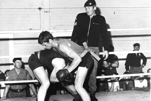 Leeds, Pudsey, 15th July 1973Sargeant Richard Dunn, a parachute regiment contender for the British heavyweight boxing championship, supervises a bout in the ring at Pudsey.BOXING FACTS:30th September 1975Richard Dunn beat Bunny Johnson on points over 15 rounds to win the British and Commonwealth heavyweight titles.