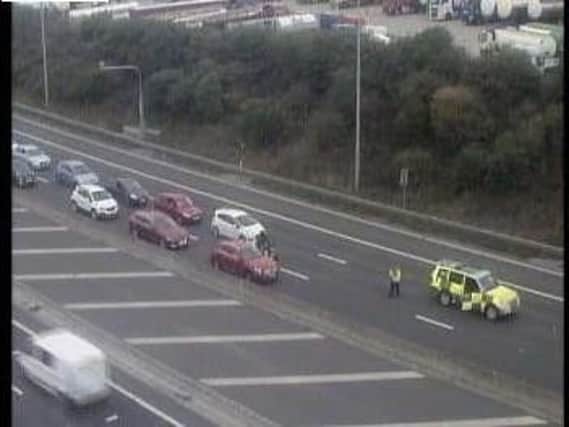 Police holding traffic on the M62 eastbound in Leeds. Picture: Crown 2018