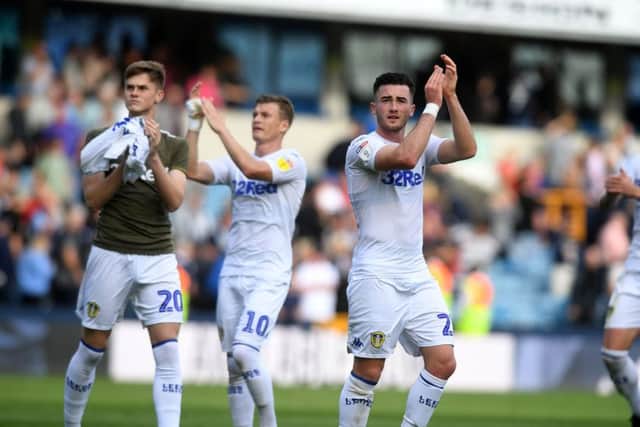 Jack Harrison applauds the Leeds United fans after full time at Millwall.