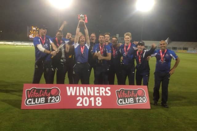 Hanging Heaton celebrate with the Vitality National Club T20 trophy