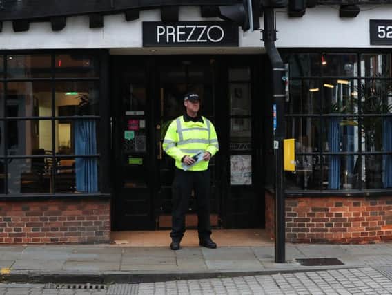 A police officer outside the Prezzo restaurant in Salisbury, where a couple had become unwell after exposure to an unknown substance at around 6.45pm on Sunday. Wiltshire Police have confirmed that there is nothing to suggest that Novichok is the substance and both people remain in hospital under observation. Jonathan Brady/PA Wire