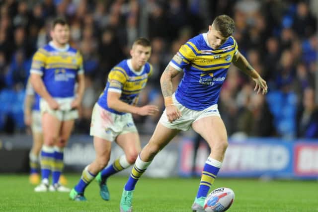 Liam Sutcliffe kicks the winning penalty goal against Salford.