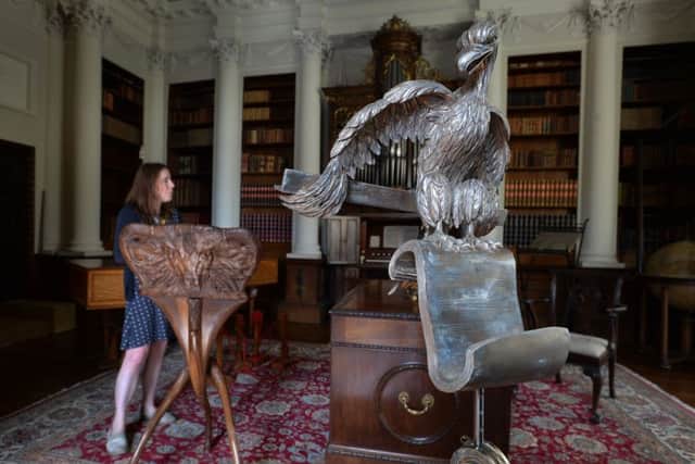 Leila Prescott, curator at Temple Newsham, with 'Pan' by Hugh Wedderburn and one by Paul Wilson - two of the  the seven specially commisioned music stands on display in the house.
The stands are part of an exhibition by the Master Carvers' Association.

 
17 September 2018.  Picture Bruce Rollinson