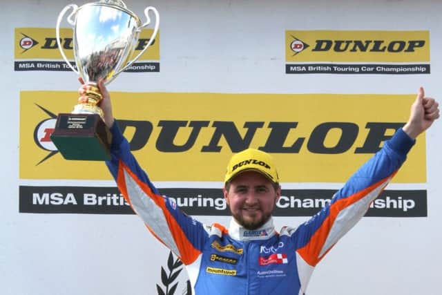 Leeds' Sam Tordoff celebrates after winning the first BTCC race at Silverstone yesterday. Picture: Paul Horton Motorsport Photography.