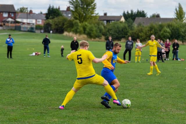 Damion Curtis and Kingsley Wetherald go toe-to-toe. PIC: James Hardisty