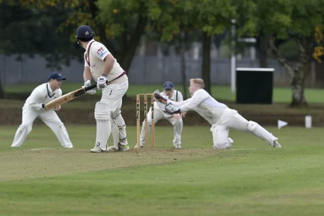 Henry Rush, of Morley, is caught by wicketkeeper Andy McIntosh, of Hunslet Nelson, off the bowling of Michael Lambert. PIC: Steve Riding