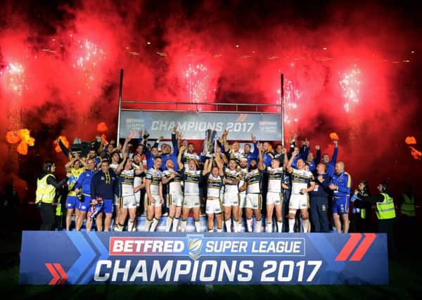 Leeds Rhinos celebrate being crowned Super League champions last year at Old Trafford.