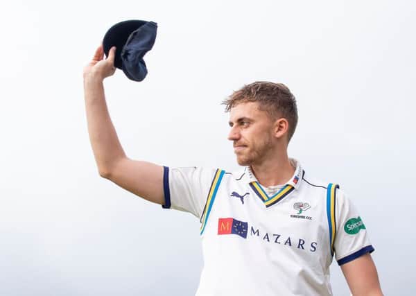 Cap doffed: Ben Coad salutes the crowd after being presented with his county cap. Its a dream come true, he said. (Picture: SWPix)