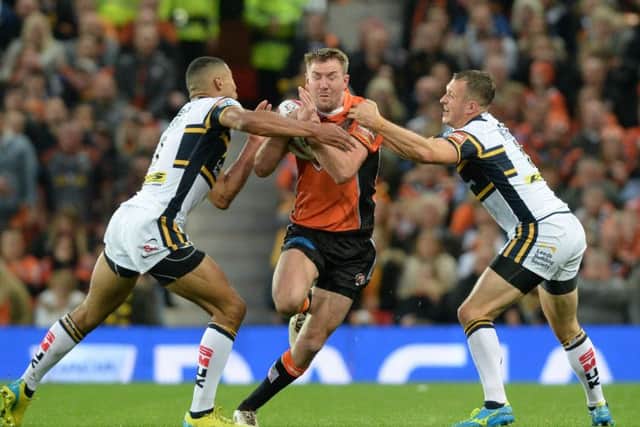 Kallum Watkins and Danny McGuire close on Michael Shenton during last year's Super League Grand Final.
