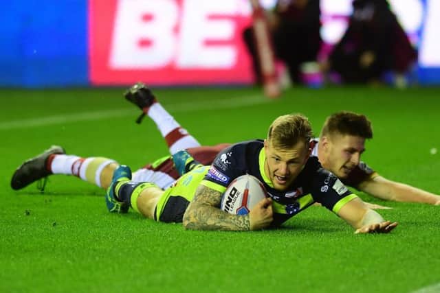 Wakefield's Tom Johnstone touches down.