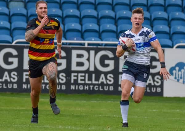 Harry Newman in action for Featherstone Rovers against Dewsbury Rams. PIC: Craig Cresswell