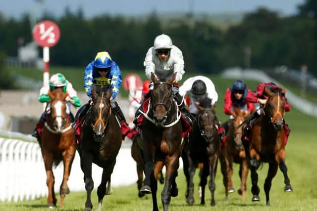Dee Ex Bee (centre). PIC:: Paul Harding/PA Wire