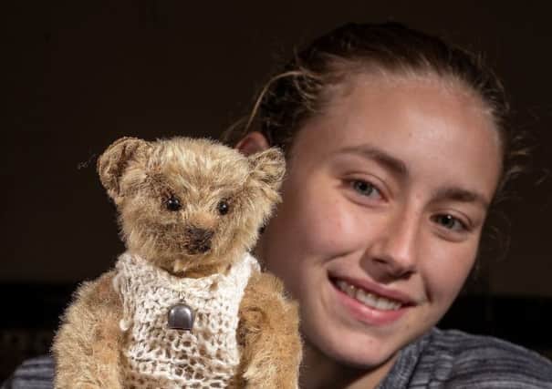 Friday 21st September 2018
Picture Credit Charlotte Graham

Picture Shows Jamie-leigh with an early steiff teddy bear, straw filled in dark gold plush, with stitched felt paws, shoe button eyes, button to left ear, wearing a small metal bell and knitted top, 10' high and expected to be worth between Â£700-Â£900


Hartleys are holding there annual vintage toys and Dolls auction on Saturday the 22nd September 2018, include in the lots are a Rare pedal Car, that is expected to fetch good money, Steiff Beer and Rare German Dolls