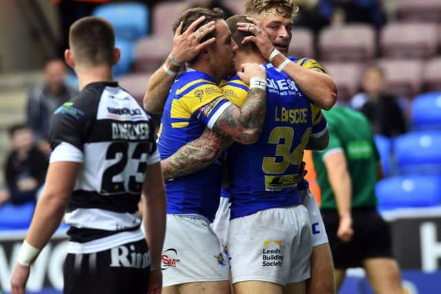 Luke Briscoe is congratulated after scoring against Widnes.