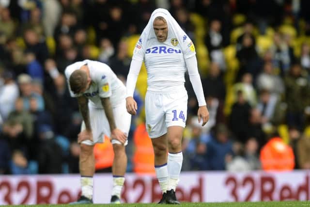 Leeds United's Pontus Jansson and Samuel Saiz show their frustration at full time.