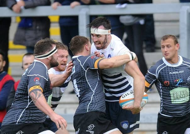 NO WAY THROUGH: Yorkshire Carnegie's Dan Temm looks for support during Sunday's Championship home defeat to Nottingham. Picture: Steve Riding.